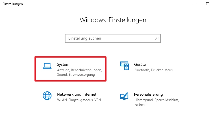 Windows-Einstellungen: Suchleiste, Kachel System (roter Rahmen) neben Geräte, Netzwerk und Internet, Personalisierung.