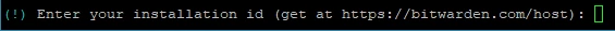 Dunkles Terminalfenster mit grünem Text: (!) Enter your installation id (get at https://bitwarden.com/host):