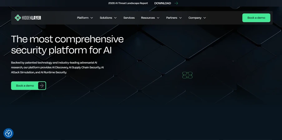 Dunkle Webseite mit sechseckigem Muster; weiße Überschrift 'The most comprehensive security platform for AI'; grüner Button 'Book a demo'